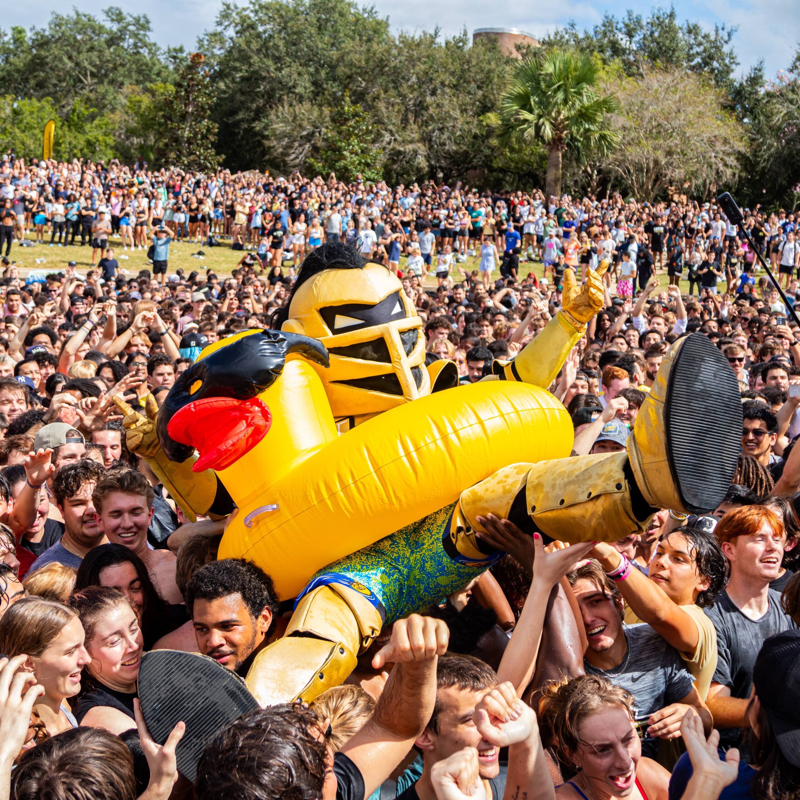Knightro Floating on Duck Floating in Spirit Splash Crowd.