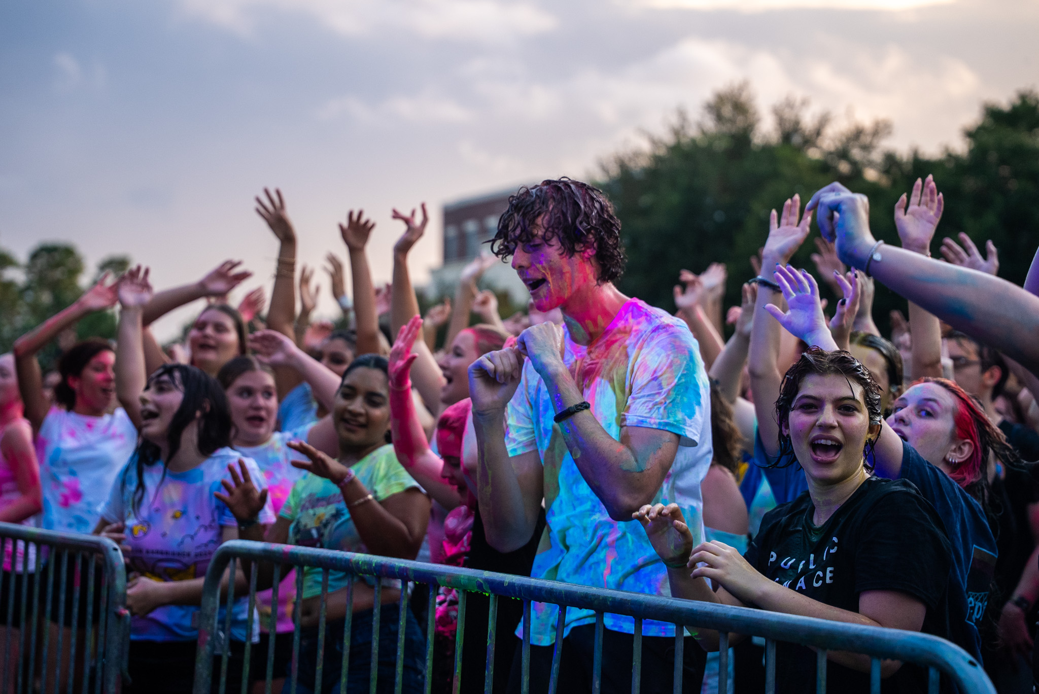 Student at paint Rave Covered in Paint