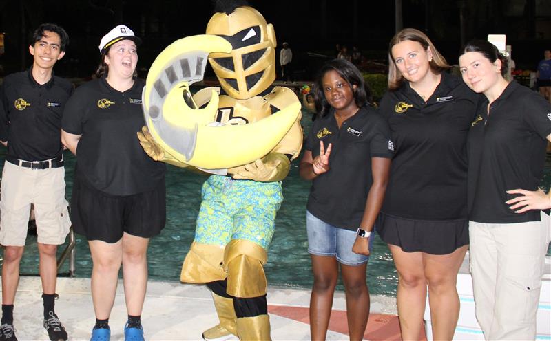 Late Knights Students with Knightro and Plushie